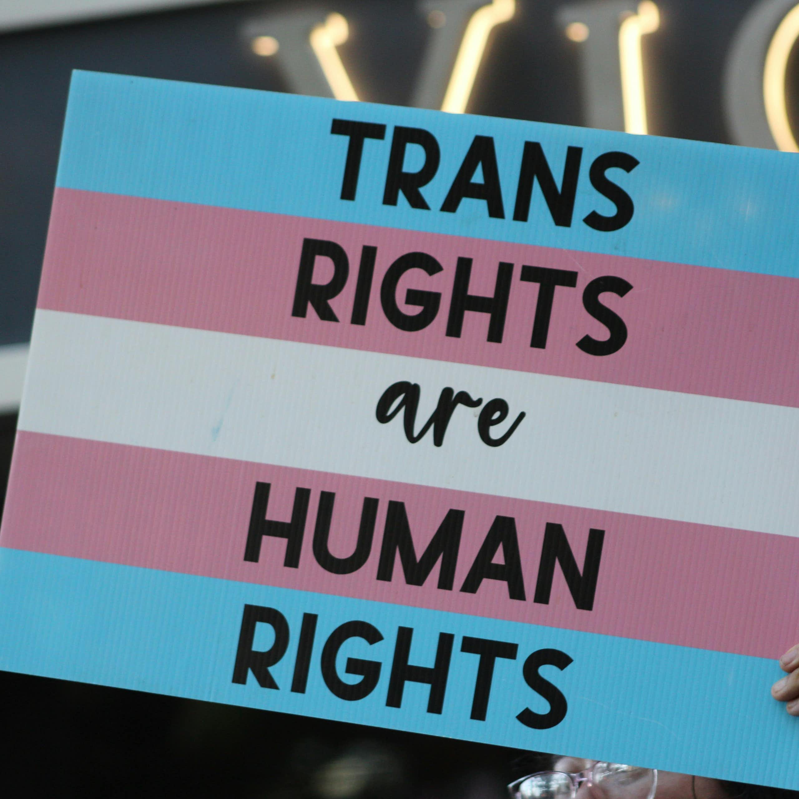 A sign defending transgender rights as human rights.