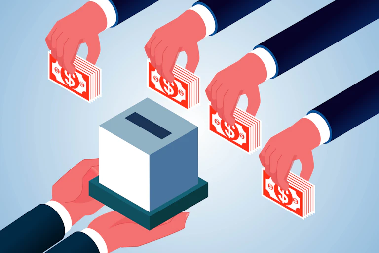 Hand holding a donation box as other hands put money into a box.