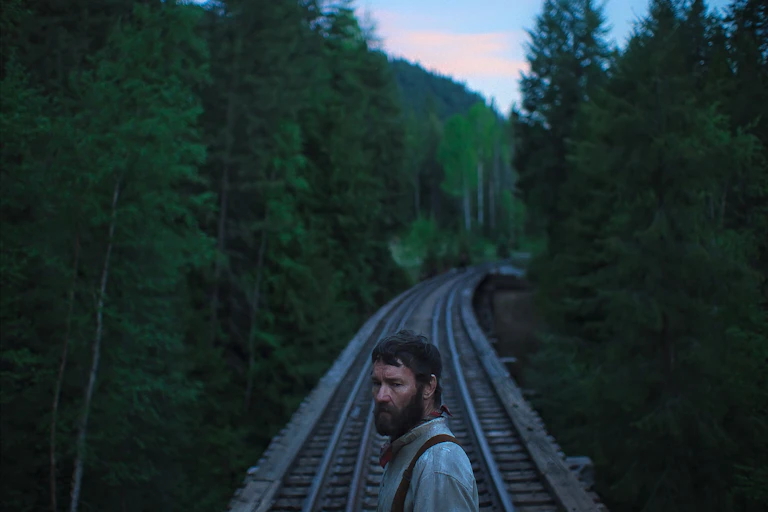A man stood on train tracks
