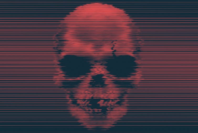 Glitchy image of a red, sinister-looking skull.