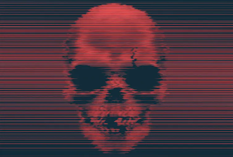 Glitchy image of a red, sinister-looking skull.