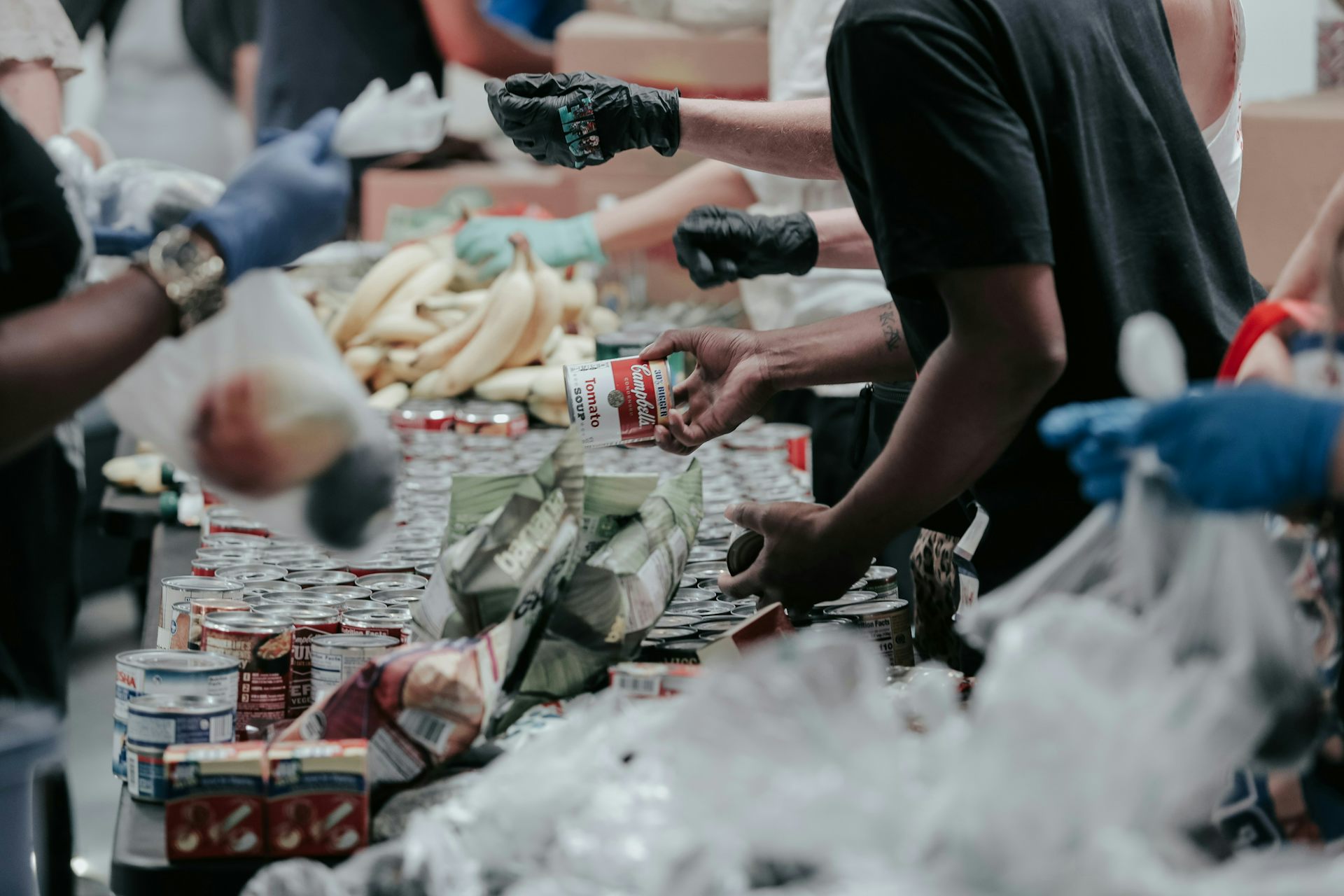 People assembling bags at a food bank
