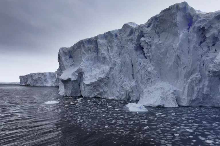 View of the edge of an ice shelf and surrounding sea