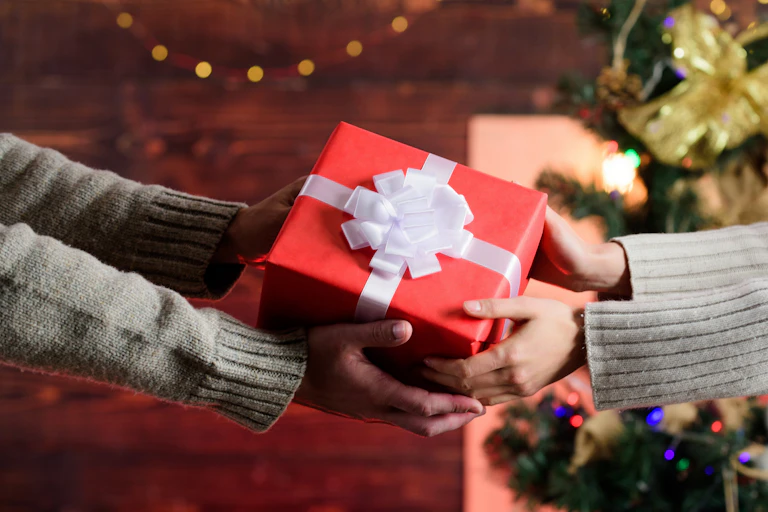 Xmas gift being handed over