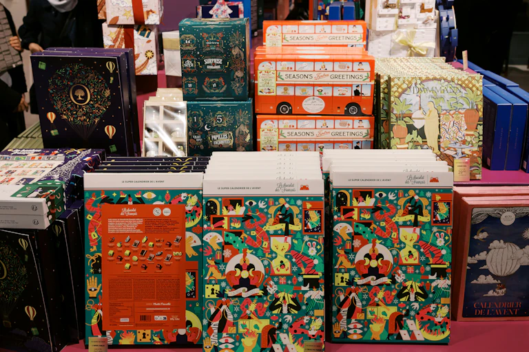 Advent calendars stacked up for sale.