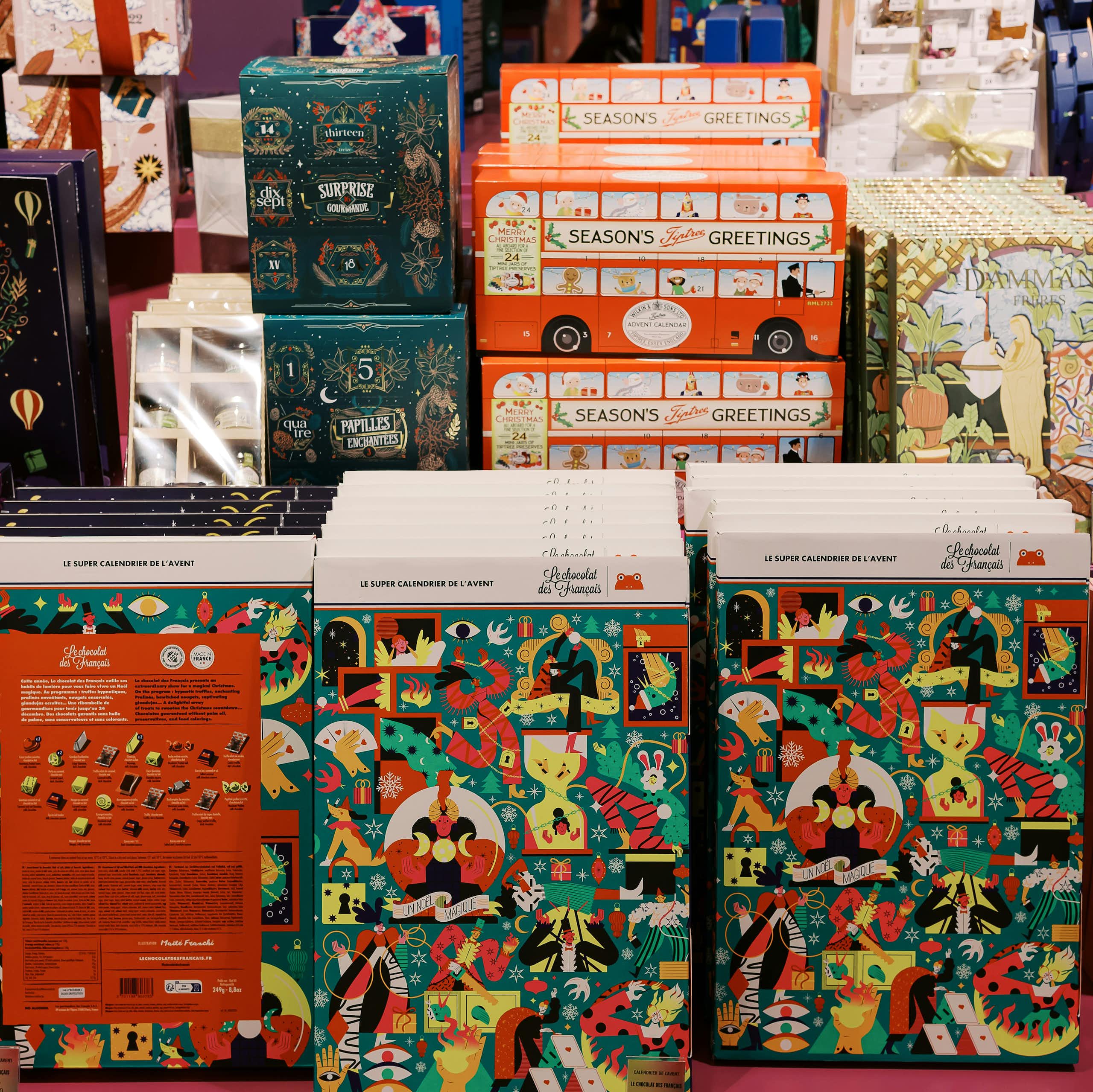 Advent calendars stacked up for sale.