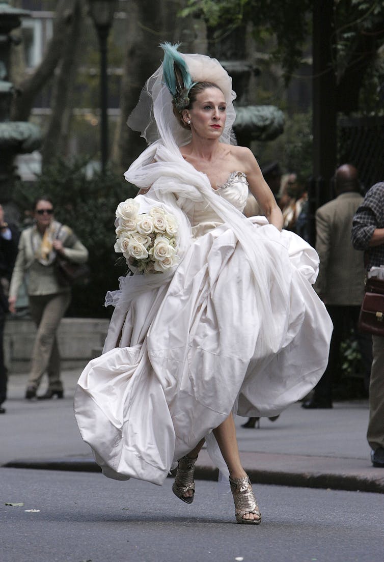 Parker in a wedding dress.