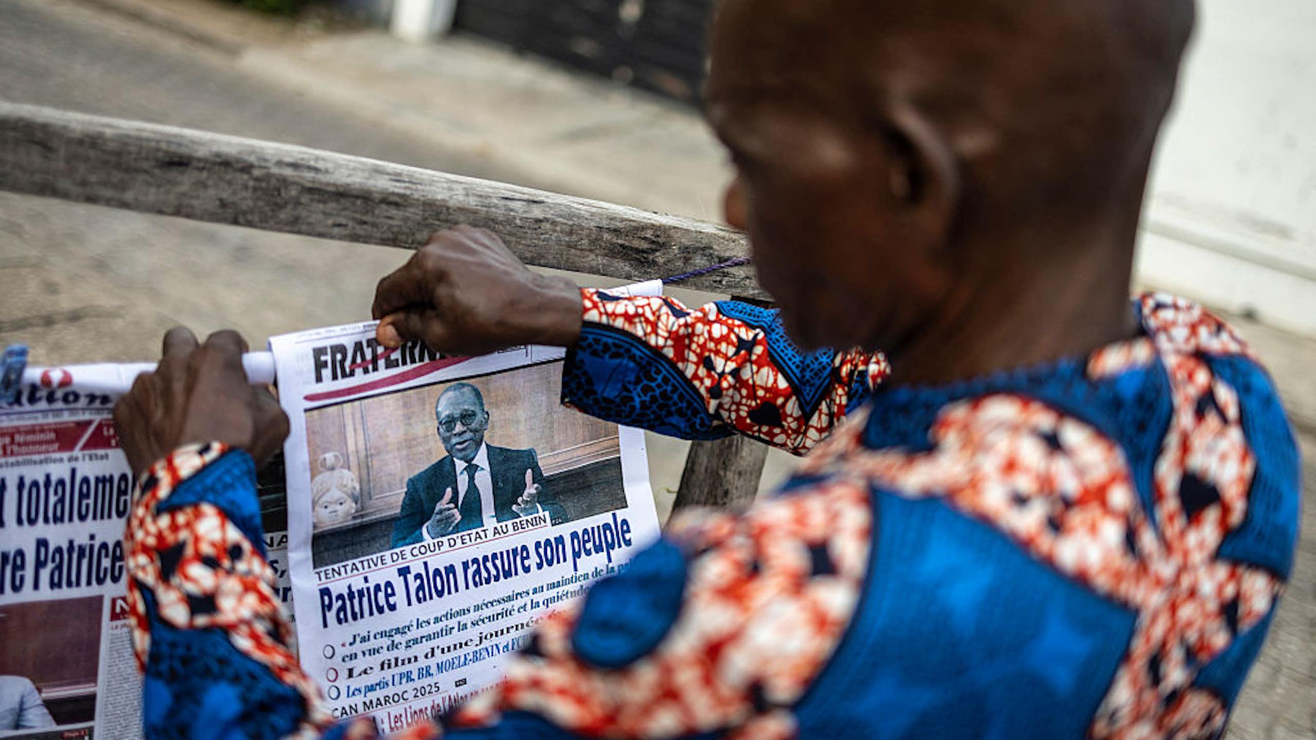 Person reading a newspaper