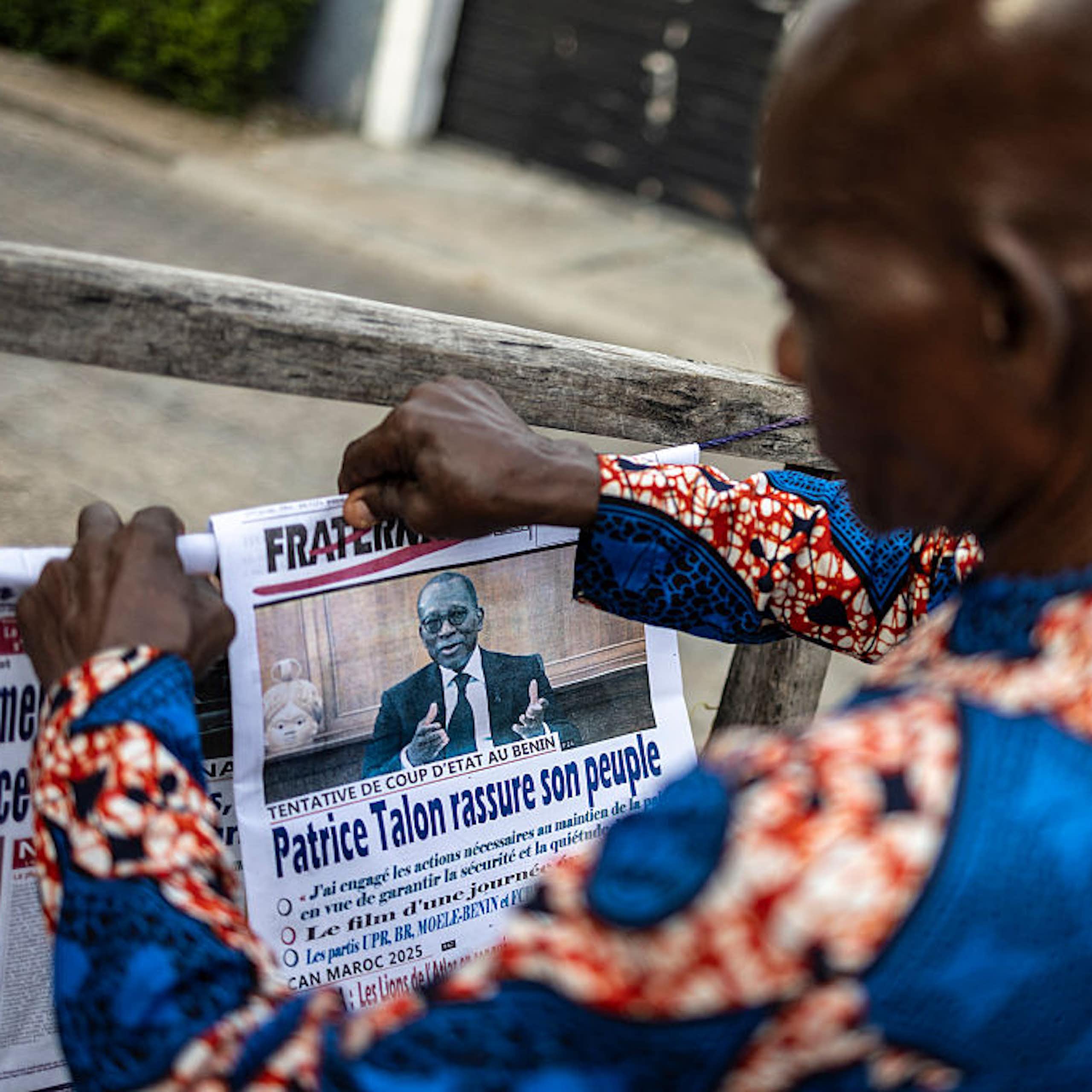 Person reading a newspaper