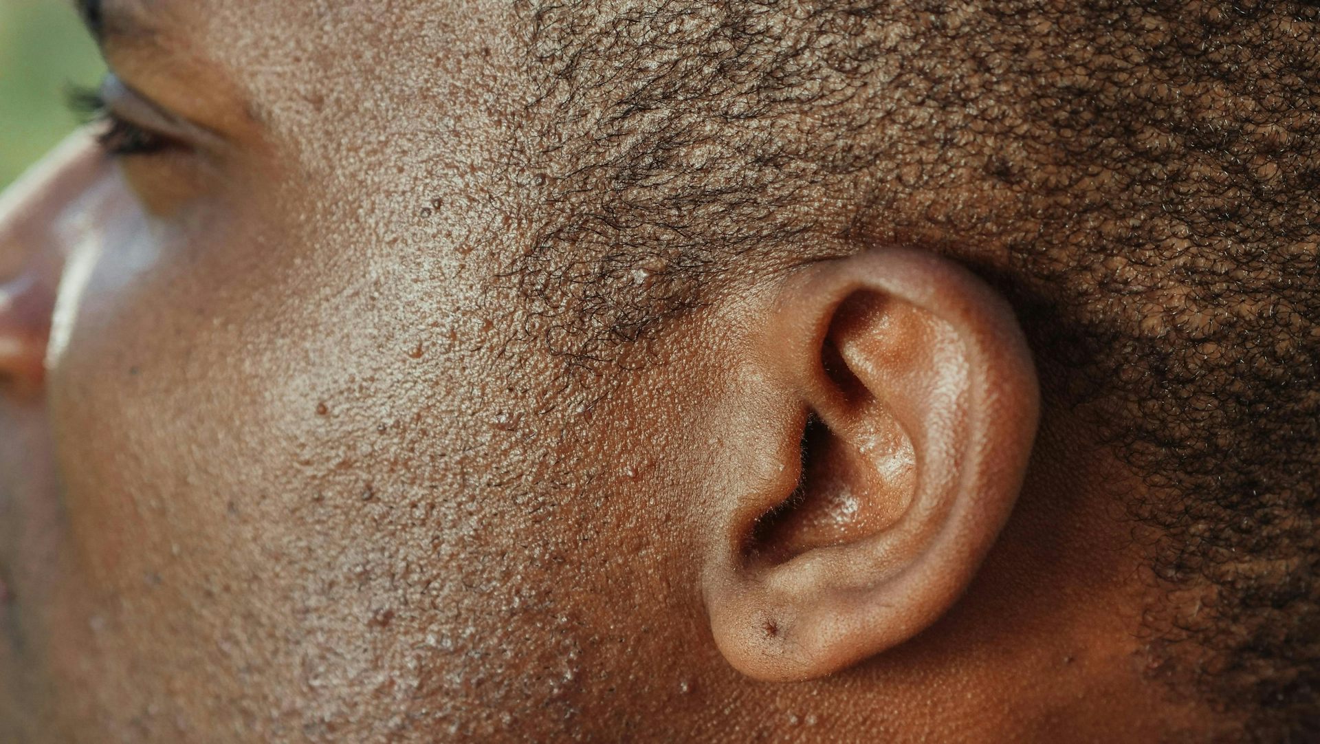 Close-up of a man's ear.