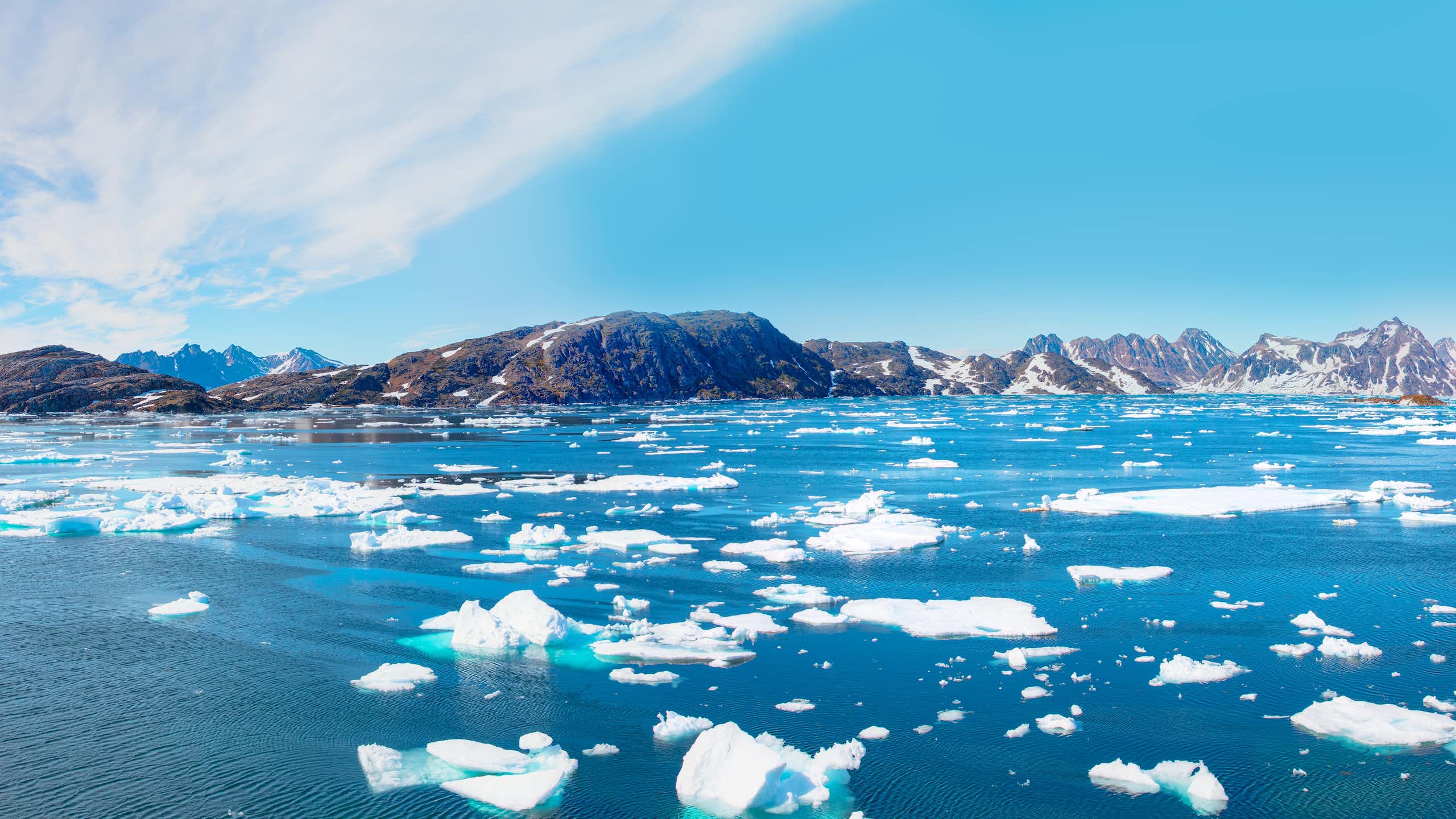 melting ice, greenland coast in background