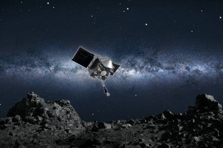 una sonda espacial acercándose a un terreno rocoso de un asteroide, Bennu