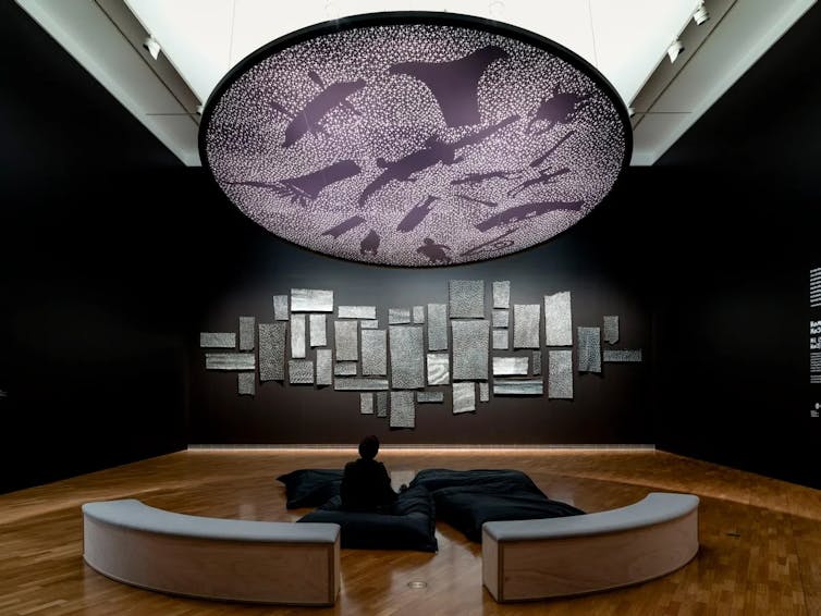 Beanbags under an installation of the Milky Way.