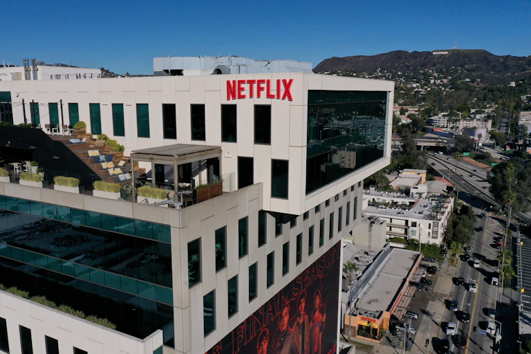 A square building with 'Netflix' written on the side.