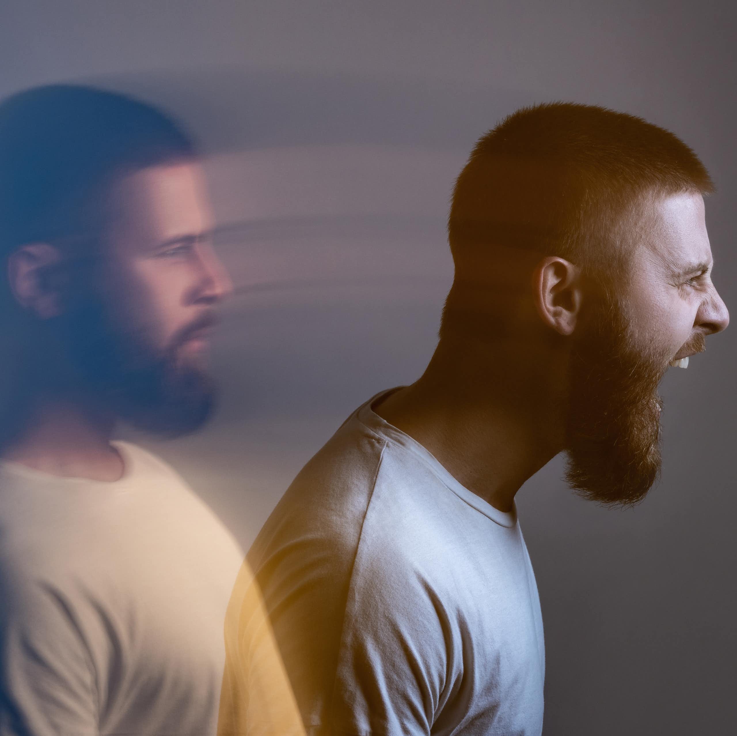 Side view portrait of two-faced man in calm serious and angry screaming expression.