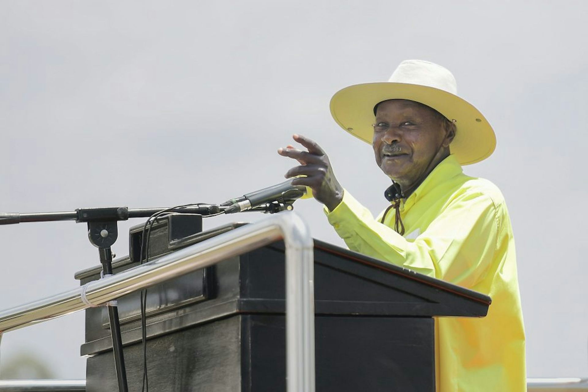 Yoweri Museveni gestures with his left hand during a campaign speech. 
