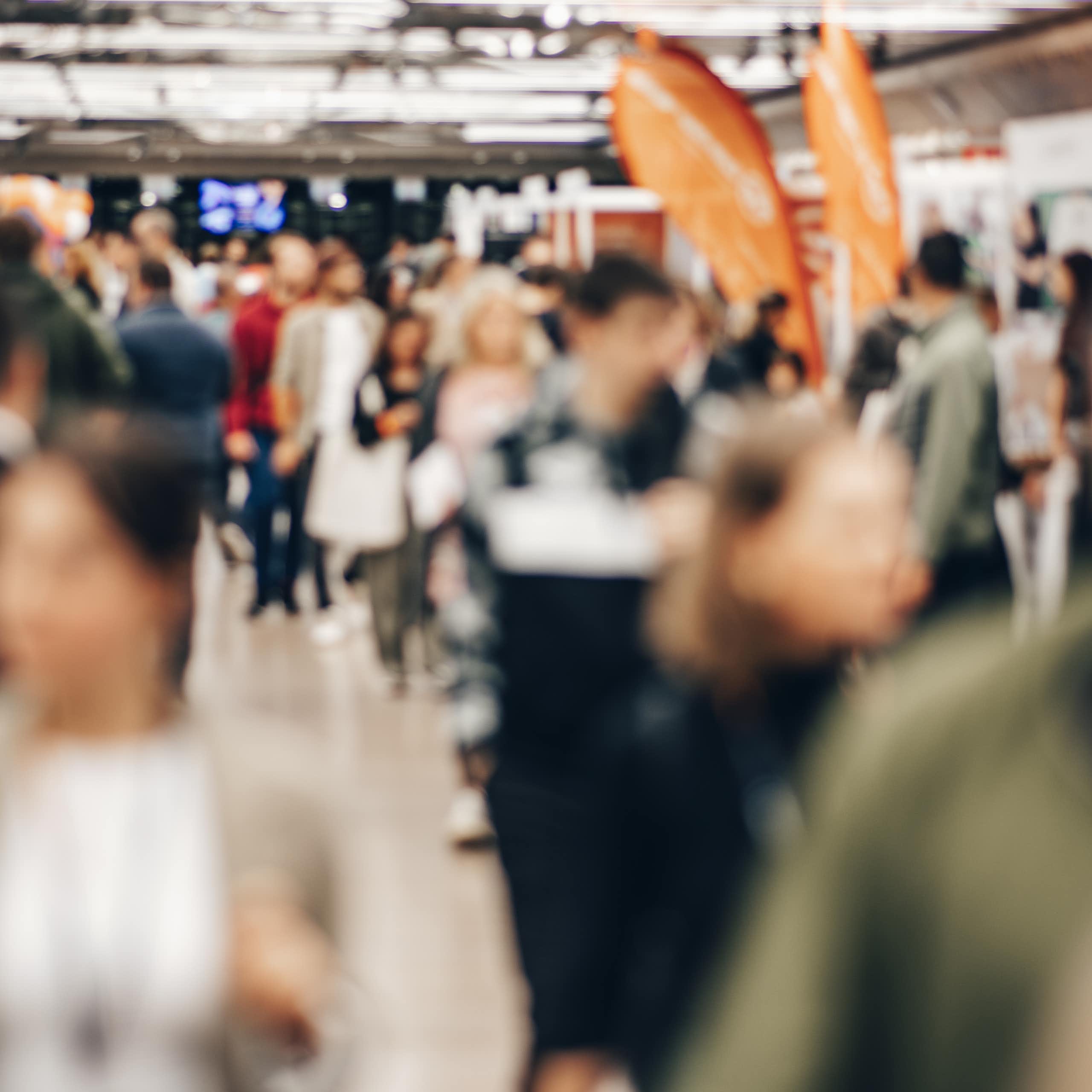 Blurred photo of people at career fair
