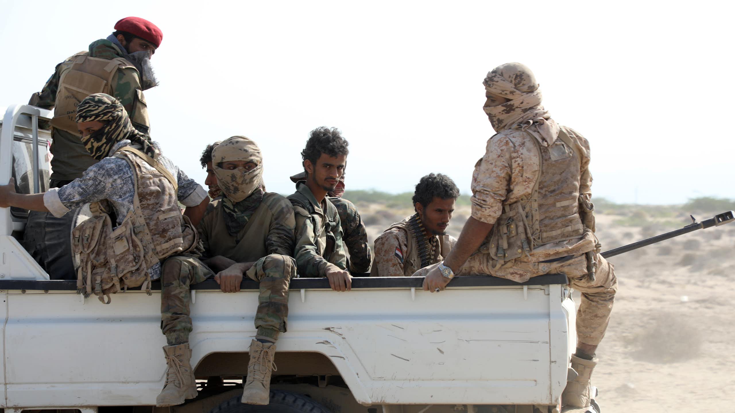 Fighters of the the Southern Transitional Council ride a truck.