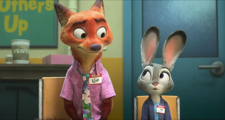 An animated scene shows a red fox and smaller grey rabbit sitting on chairs next to each other, looking at each other warily.