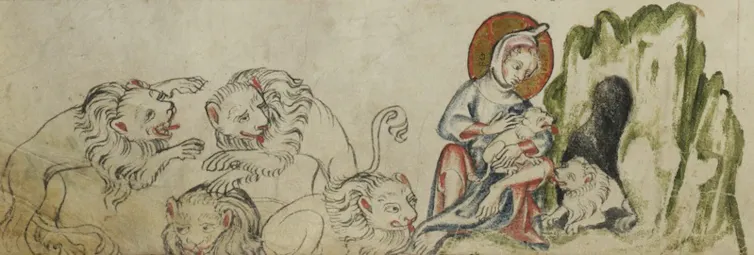 An illumination of a pack of lions looking at a young boy with a halo who is stroking a cub outside a cave.