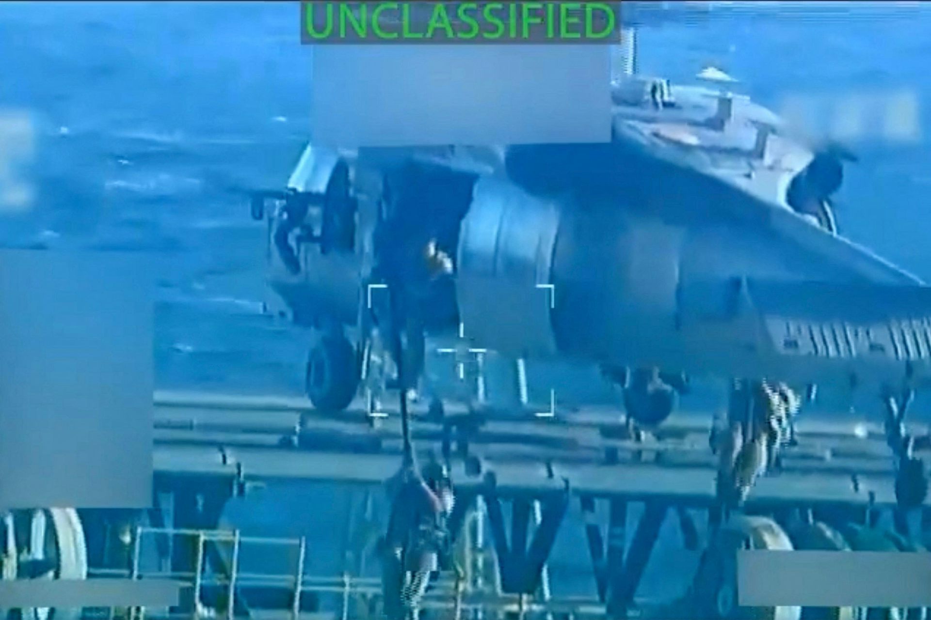 Screenshot of footage released by the US attorney-general's department shows US troops rappeling on to the deck of an oil tanker, December 10 2025.