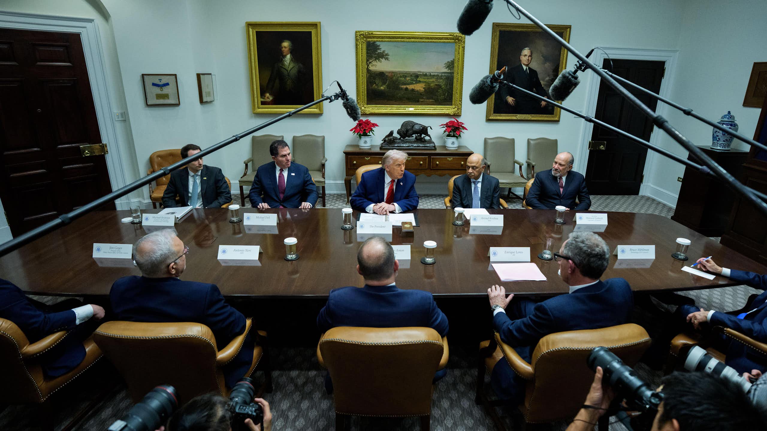 Donald Trump talks to journalists at a meeting in the Roosevelt Room at the WHite House, December 10.