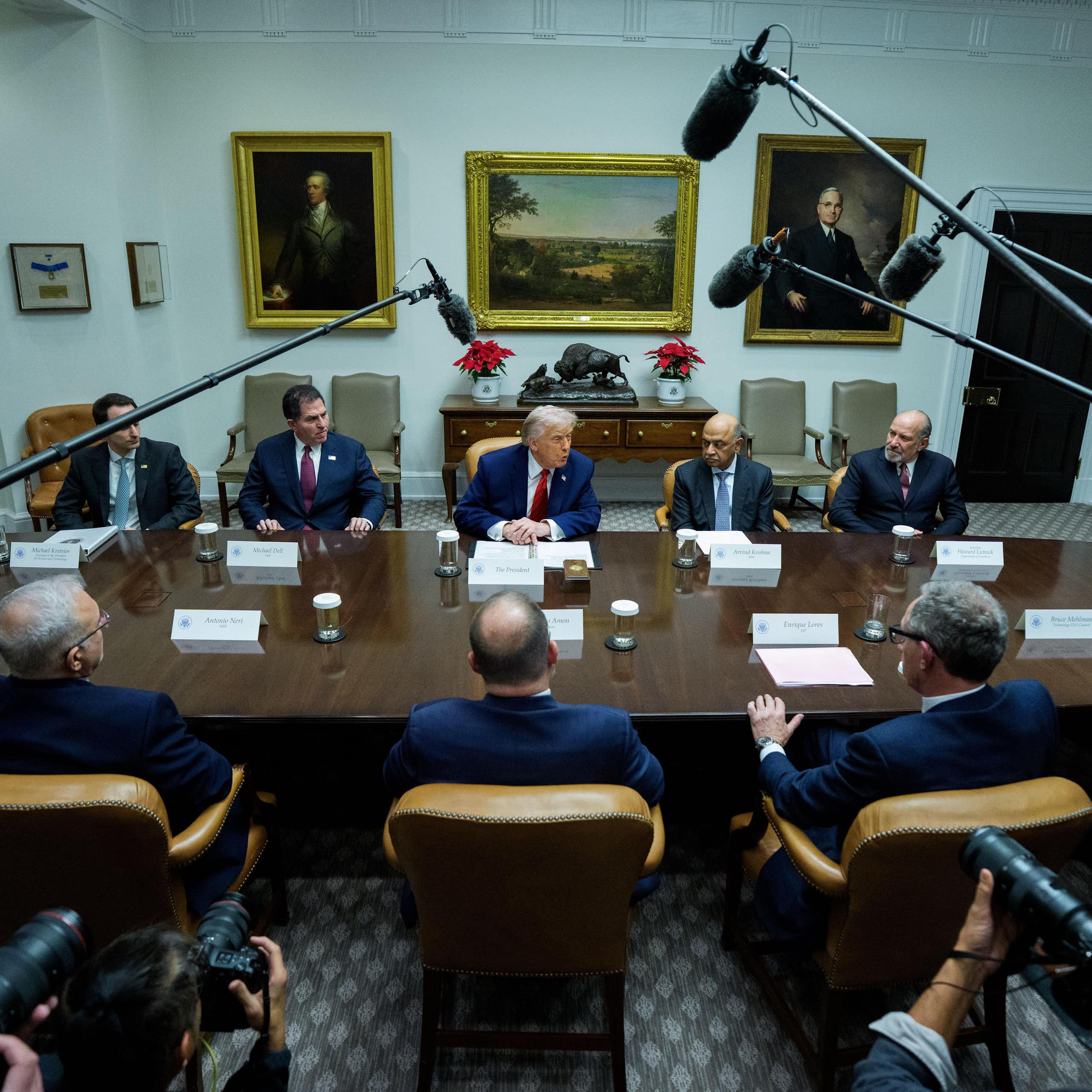 Donald Trump talks to journalists at a meeting in the Roosevelt Room at the WHite House, December 10.