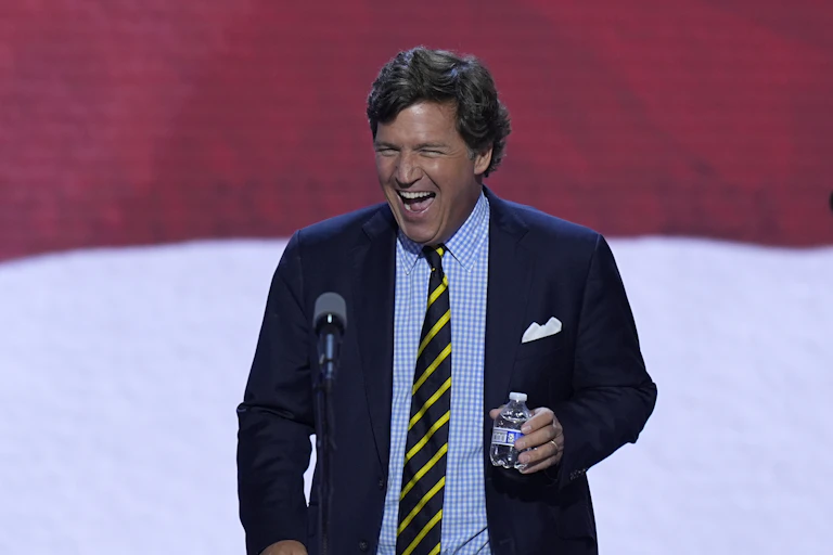 Tucker Carlson appearing at the Republican National Convention in 2024.