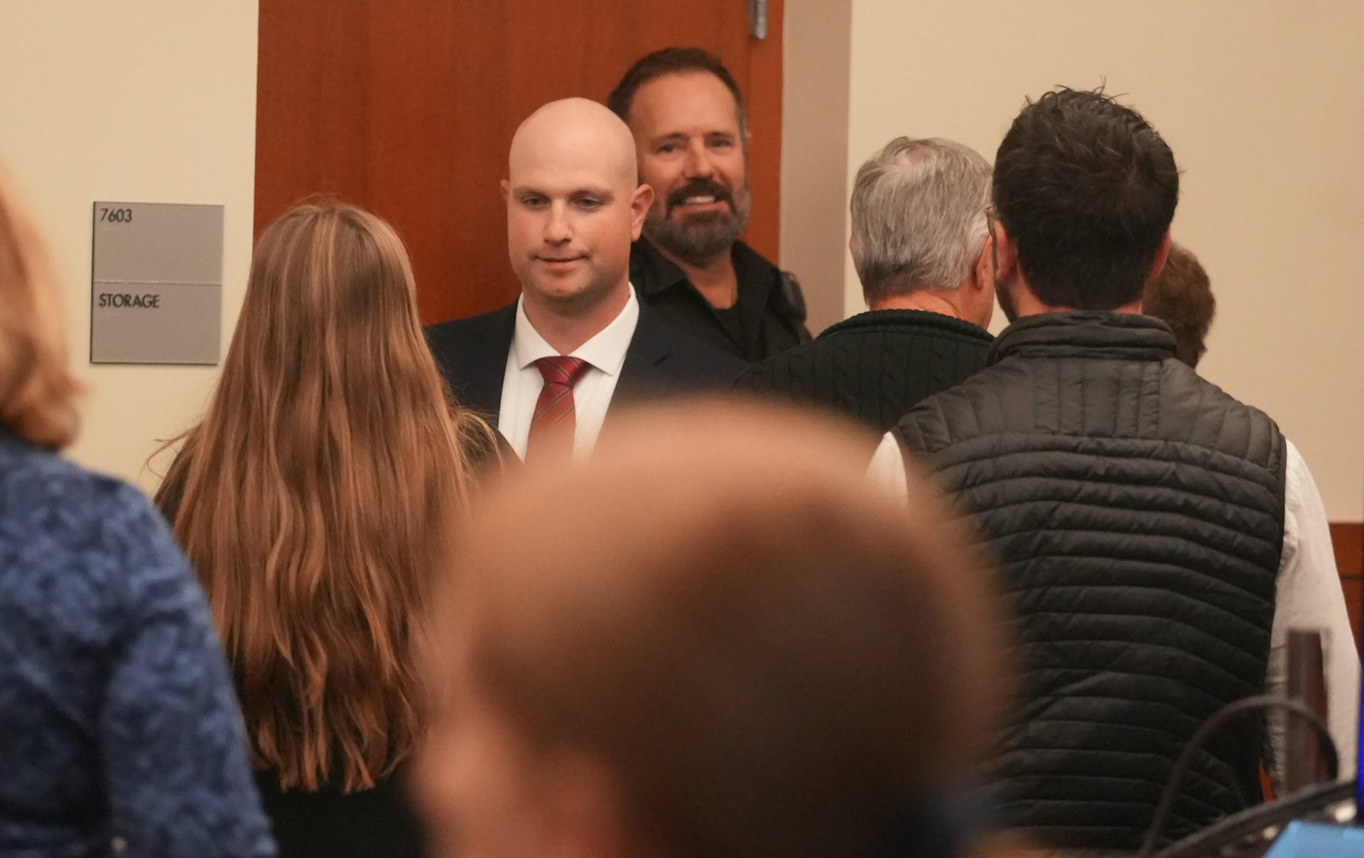 Blendon Township, Ohio, police officer Connor Grubb greets a family member after being found not guilty at a Columbus courthouse.