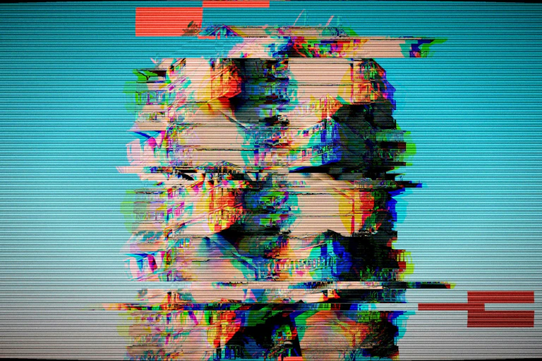 Distorted faces on a glitchy television screen