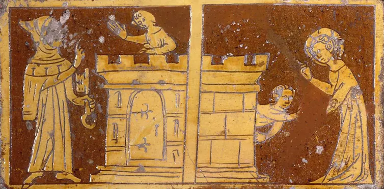 A dark red or brown tile has lighter etchings on it, with scenes of a man standing next to a tower that a child stands atop, and then the child exiting the tower as another figure with a halo looks on.