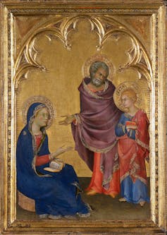 A painting with a gold frame and background shows a man and woman with halos talking to a child with a halo, who has his arms crossed.