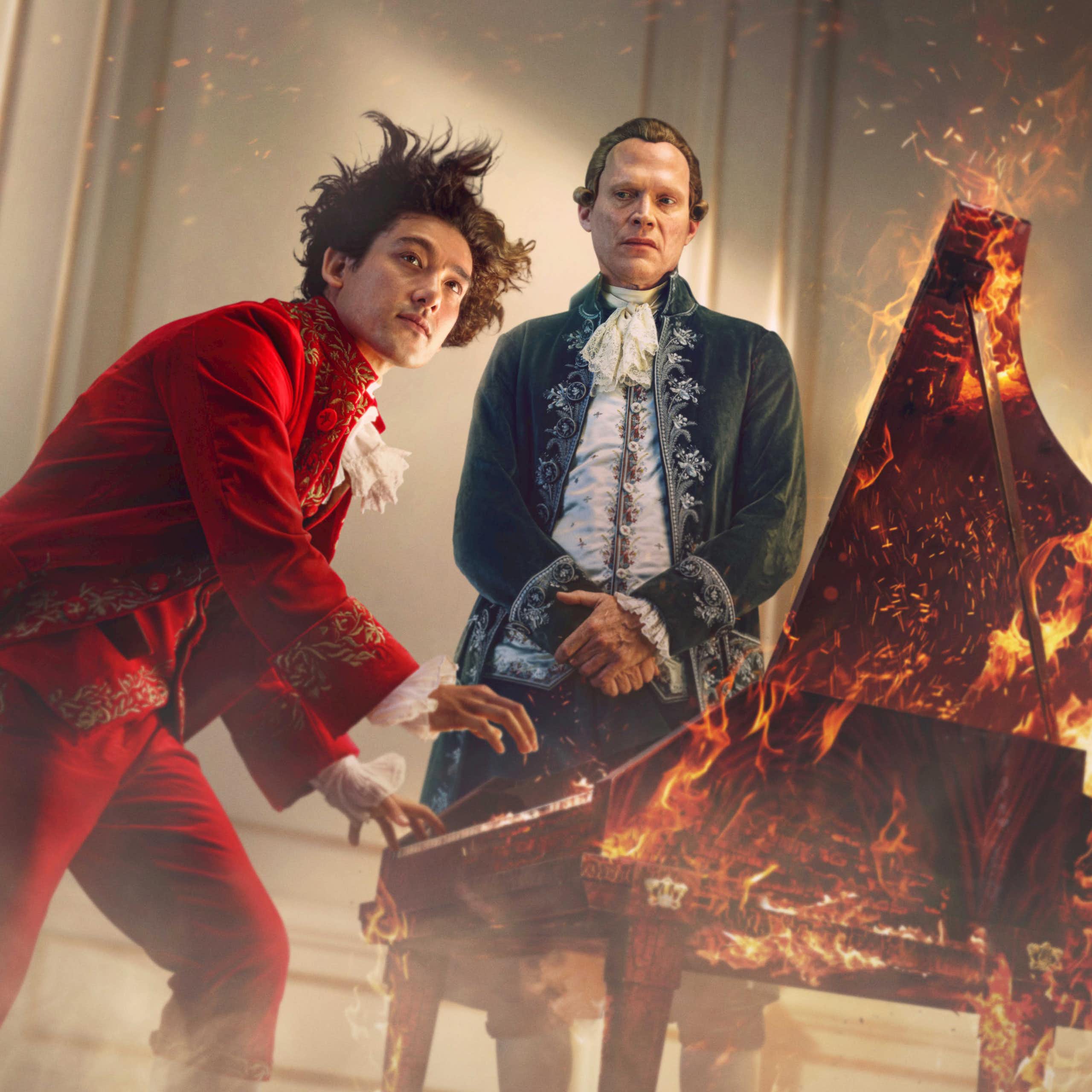 Will Sharpe as Mozart playing a piano which is on fire