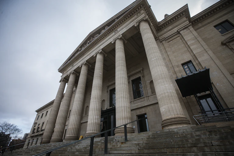 A legislature building with tall columns.
