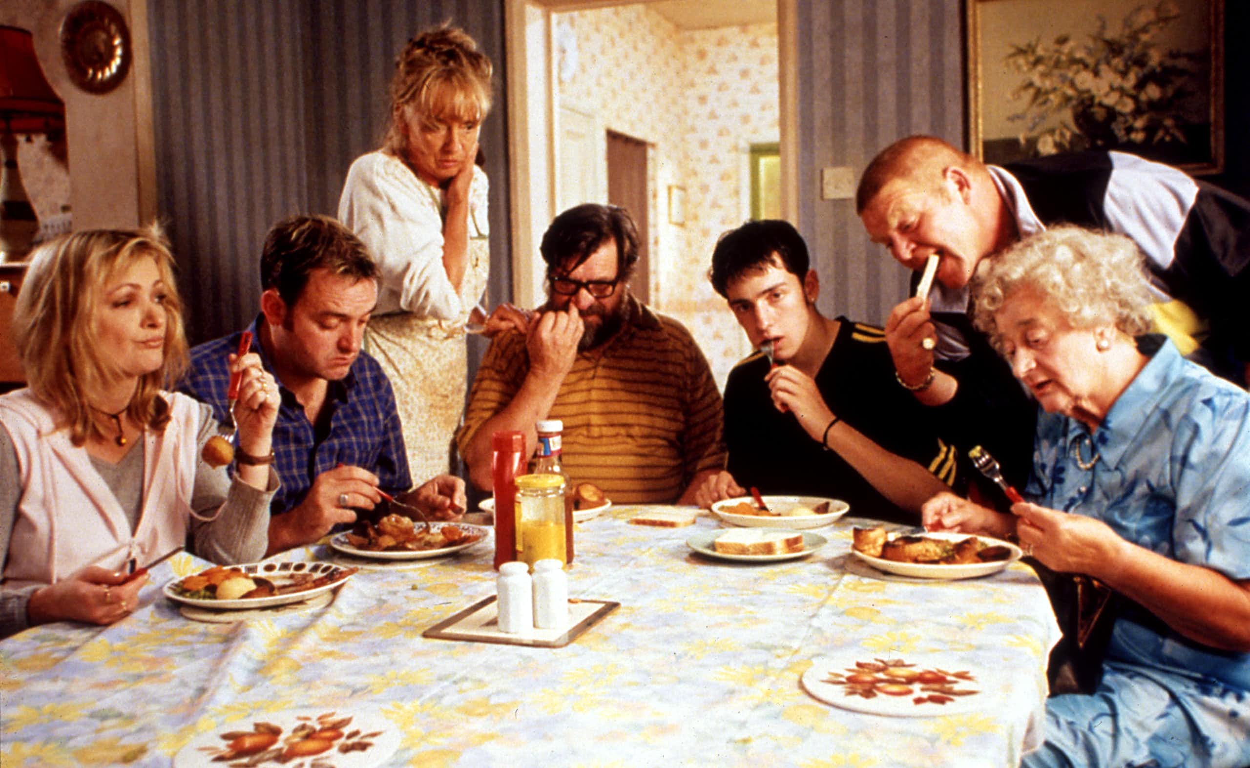 TV's Royle family eating a roast dinner together.