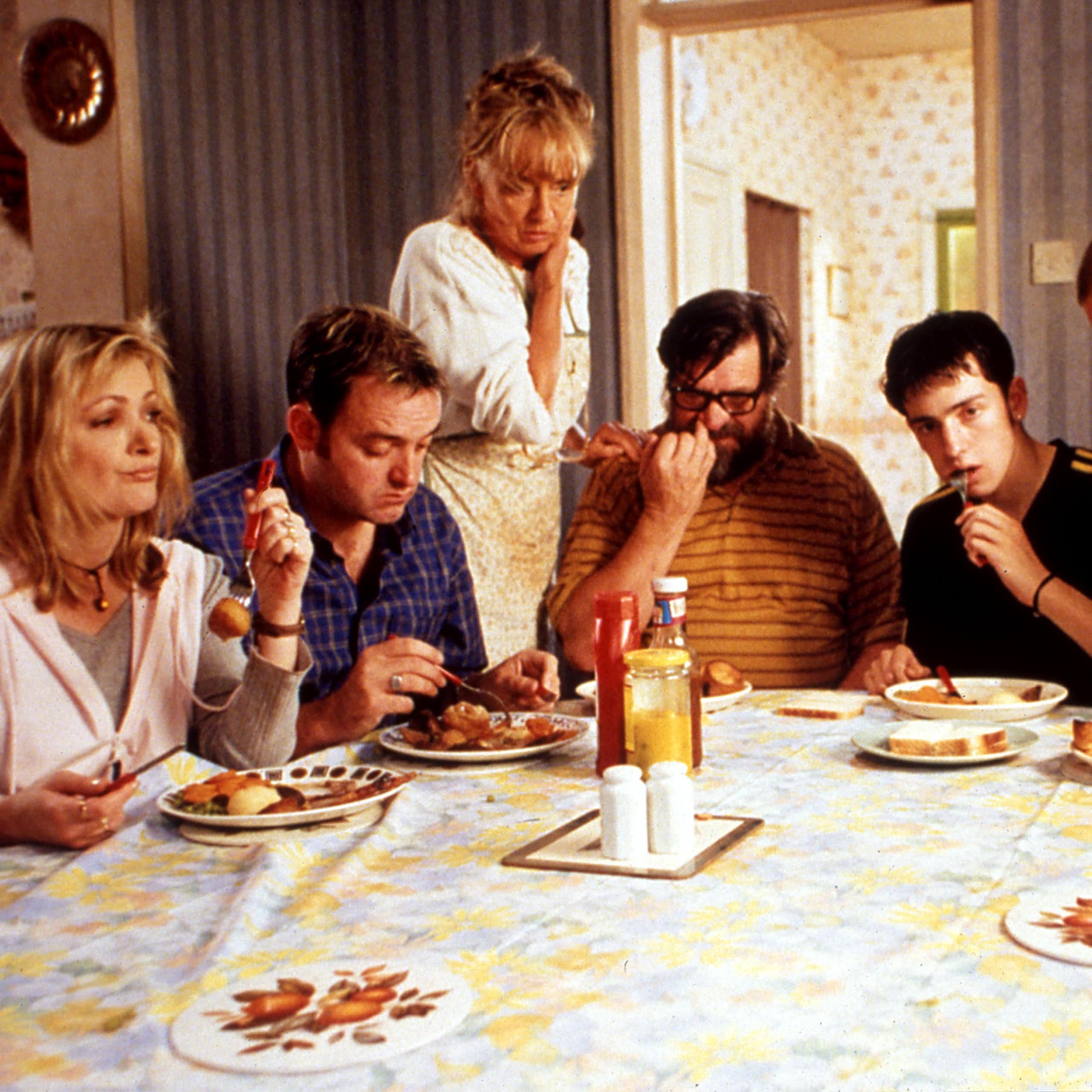 TV's Royle family eating a roast dinner together.