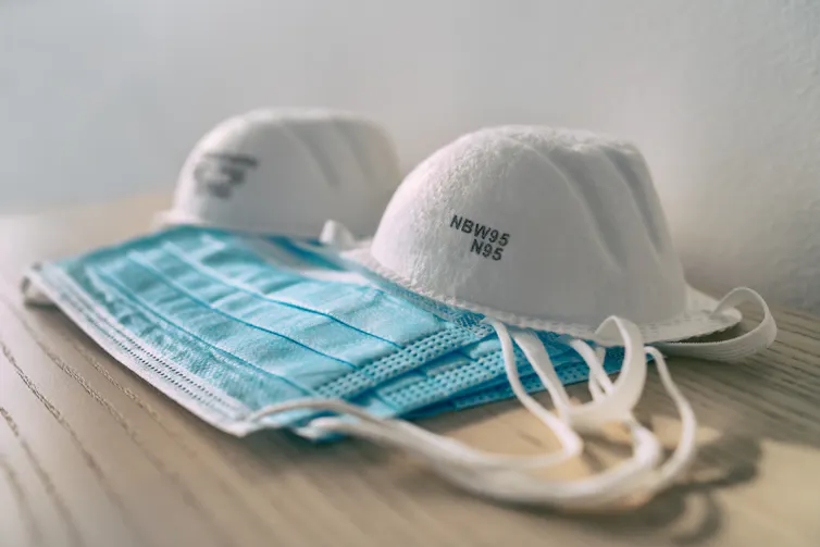 Blue surgical masks and white N95 masks.