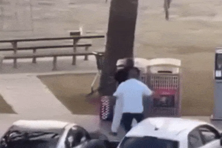 A bystander tackles a gunman at the Bondi Beach mass shooting