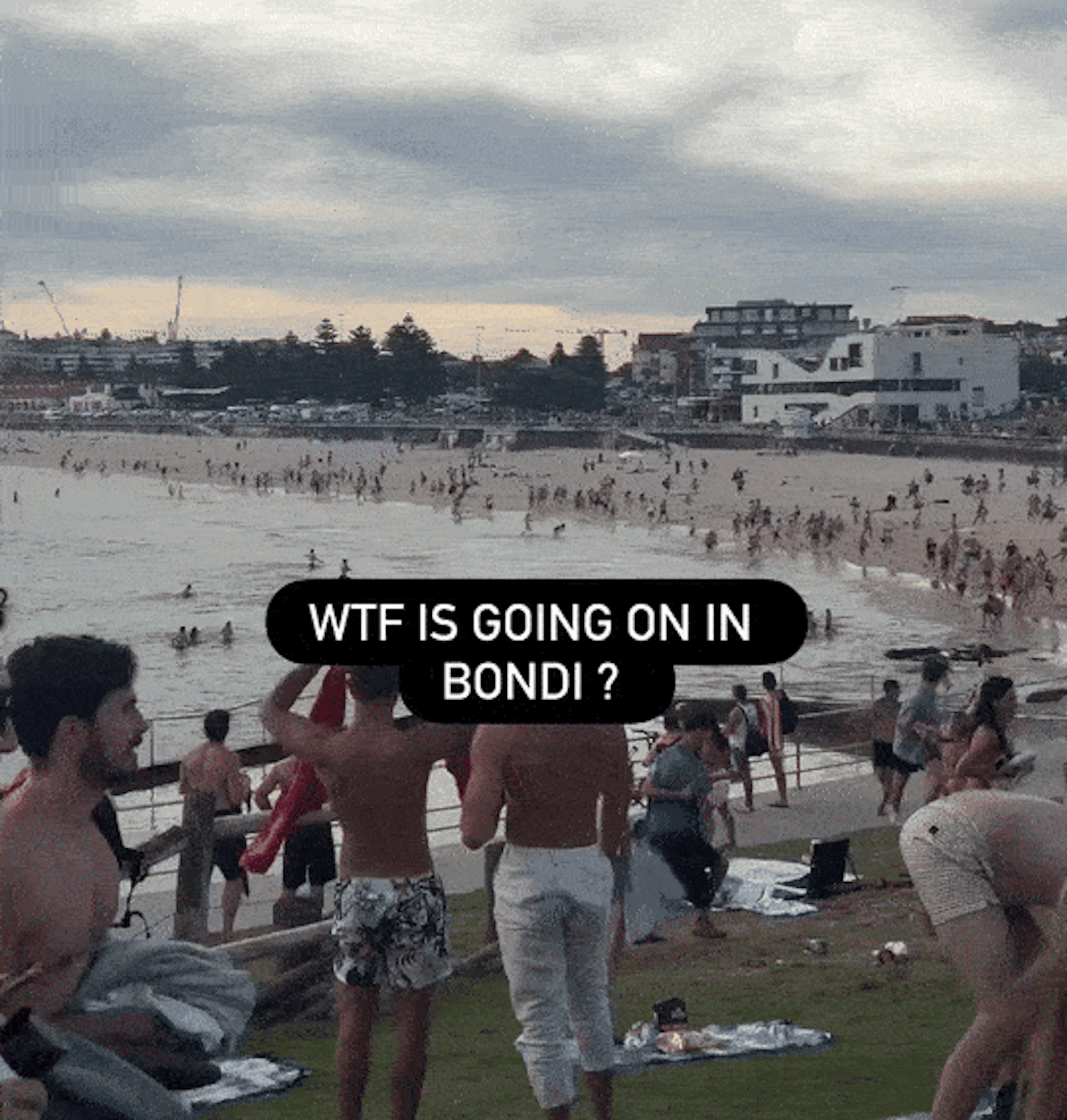 Beachgoers seen running from shots.