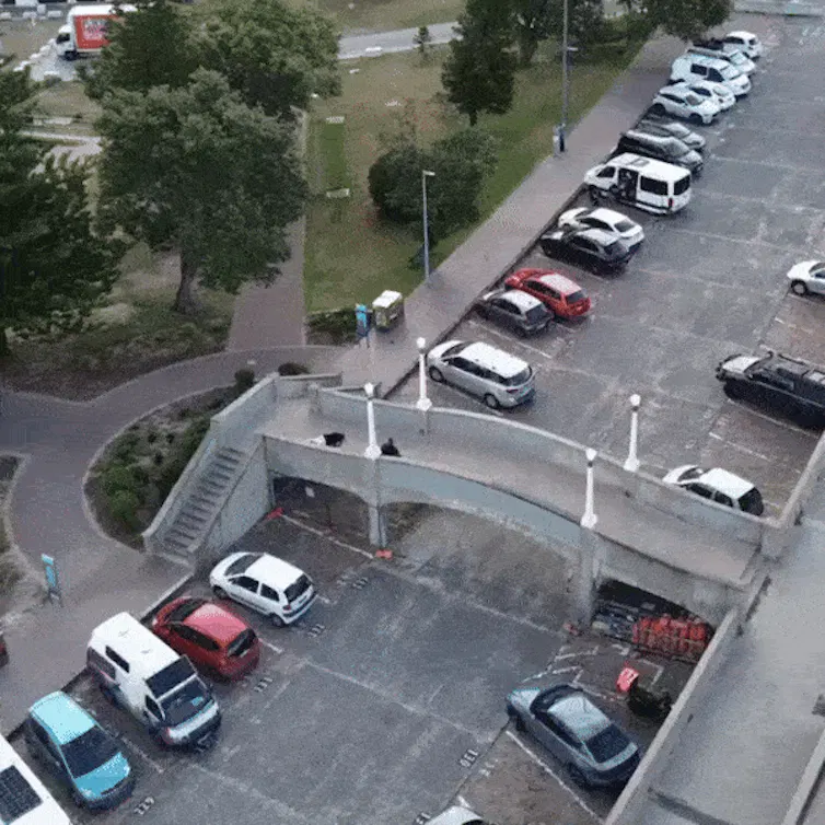 Drone footage shows one gunman down while a second remained firing.