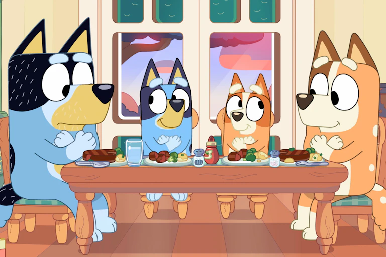 The healer family sit at the kitchen table.