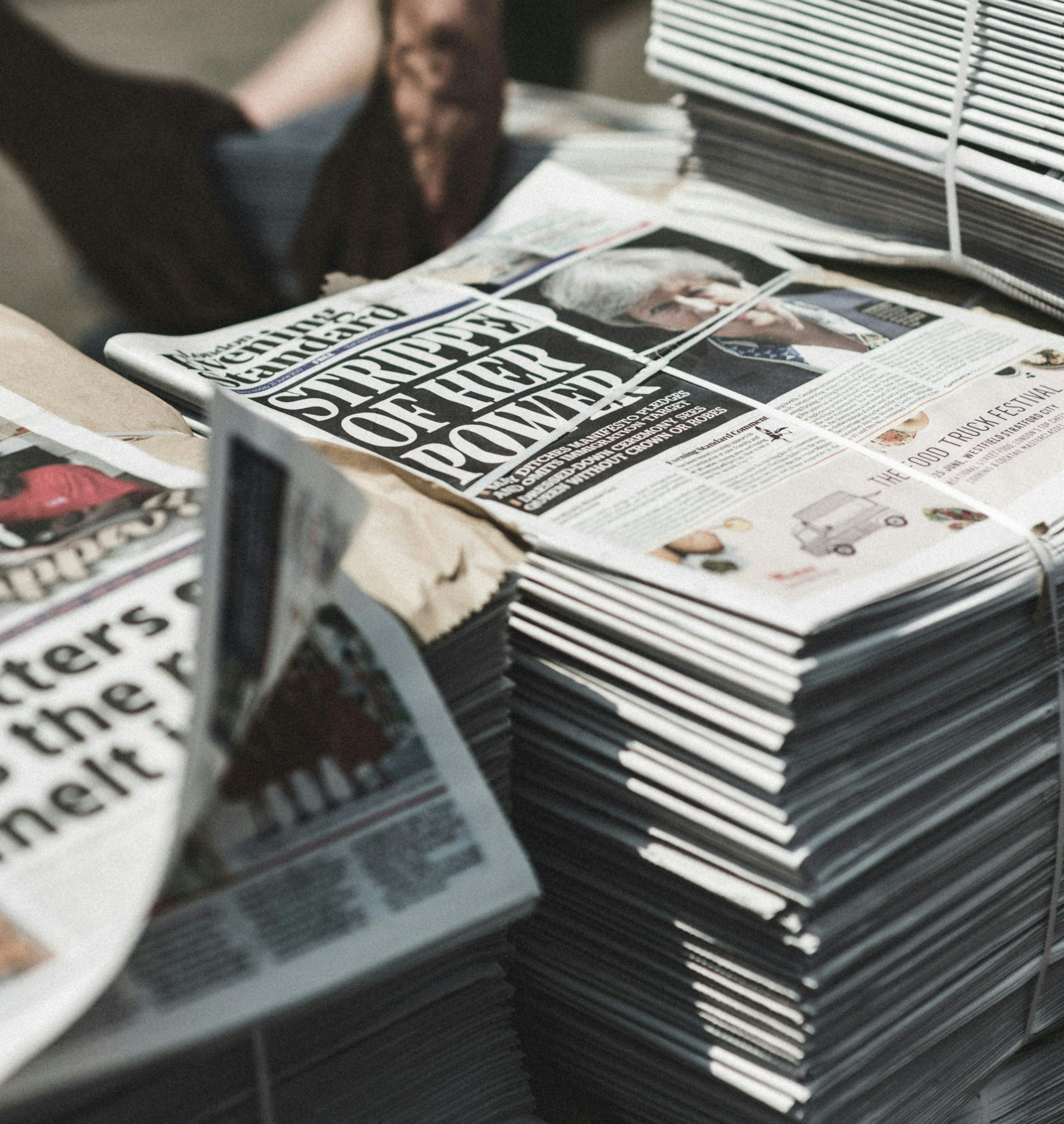 A stack of newspapers.