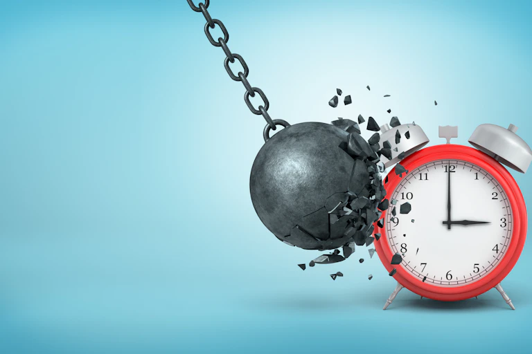 3D rendering of a big black iron wrecking ball breaking itself when hitting a large red alarm clock.