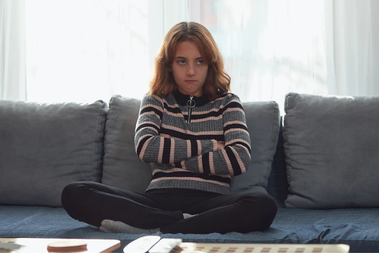 Bored girl on sofa
