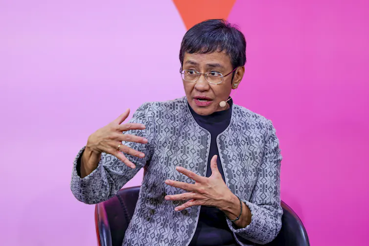 Fillippina journalist Maria Ressa gestures as she talks.
