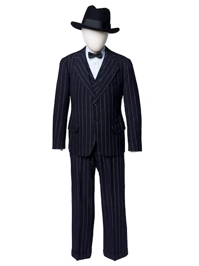 A black, pinstriped, three-piece suit and Stetson hat displayed on a mannequin.