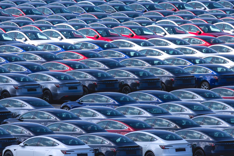 A car park full of Tesla electric cars.
