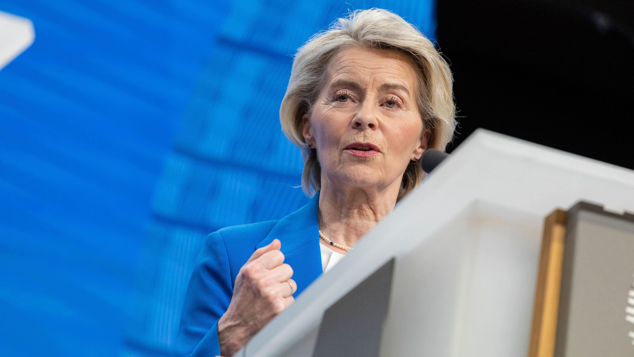 European Council president Ursula von der Leyen speaks at a podium