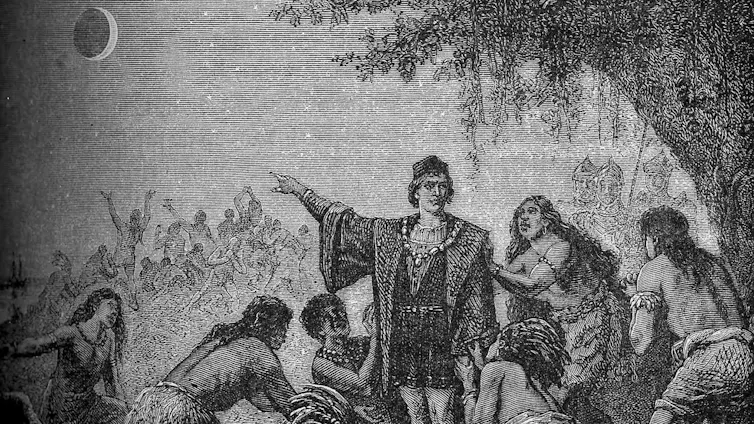 Ilustración del siglo XIX que representa a Colón señalando un eclipse lunar a la población nativa en Jamaica.