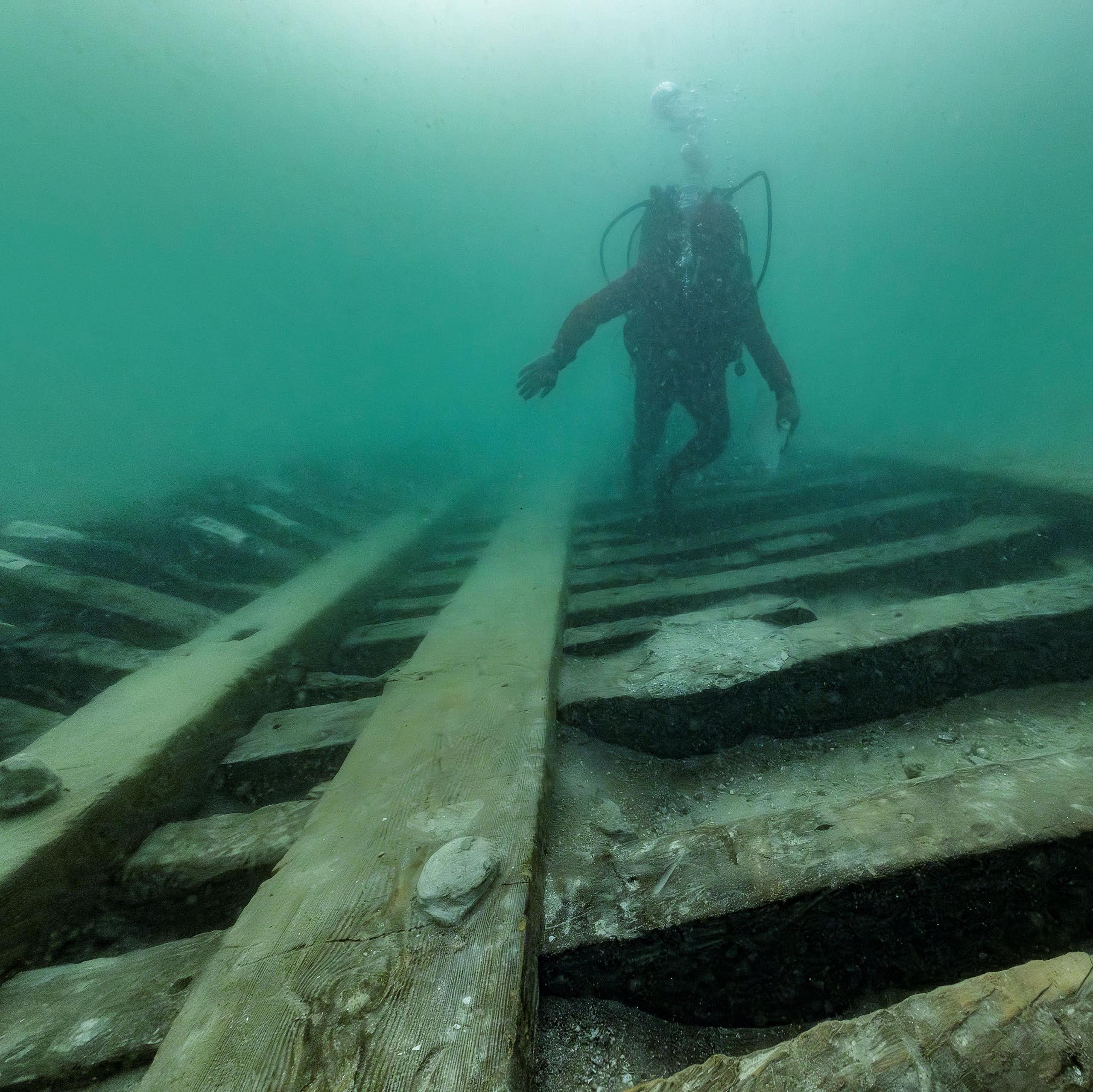 Divers examining the wreck.
